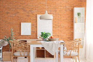 Interior of modern dining room with table and chairs