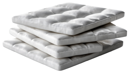 Comfort Stacked: A neat stack of four plush, white, square cushions beckons with their tactile appeal, offering a promise of unparalleled relaxation and ease.