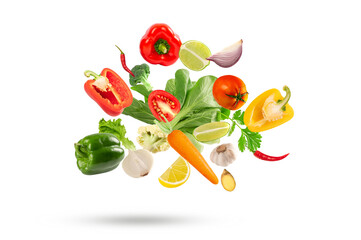 Falling fresh vegetables with spicy and herb on a white background.