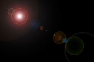 Bright light effects create captivating lens flare against a dark background during nighttime exploration