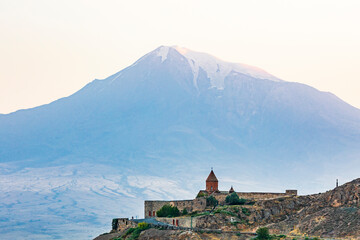 Fototapeta premium Western Asia. Eurasia. South Caucasus. Republic of Armenia. Ararat Province. Lusarat. View of the Khor Virap Monastery with Mount Ararat in the distance.