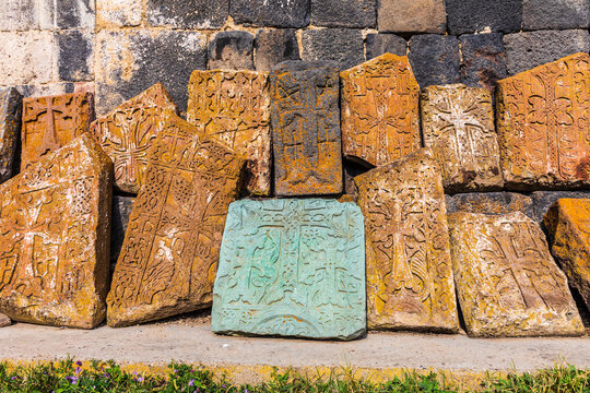 Western Asia, Eurasia, South Caucasus, Republic of Armenia. Sevan. Carved stone tablets outside of the church of Surp Arakelots at the Sevanavank Monastery complex on Lake Sevan.