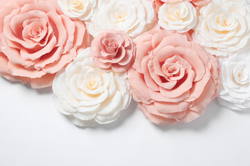 Beautiful paper flowers on white background, flat lay