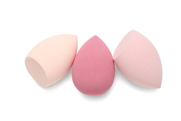 Makeup sponges on white background