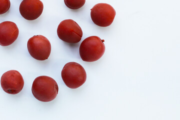 Umeboshi, Japanese pickled plums, Sour and salty taste.