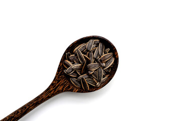 Roasted sunflower seeds on white background.