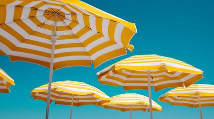 yellow beach umbrella and chairs