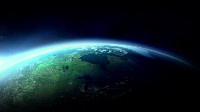 Earth rotating in space with city lights visible at night