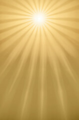 Golden rays of light stream from a brilliant sun creating a warm, ethereal glow that evokes a sense of peace, divinity, and celestial illumination.