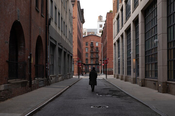 Person walking down the street in Tribeca New York City