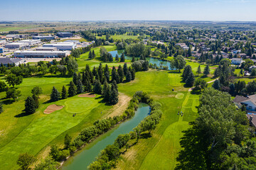 Golf course with a river running through it