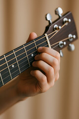 Acoustic Guitar Chord: A musician's hand deftly forms a chord on an acoustic guitar, capturing the essence of musical passion and practice.