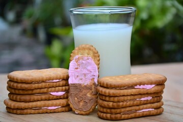 A glass of milk and cookies