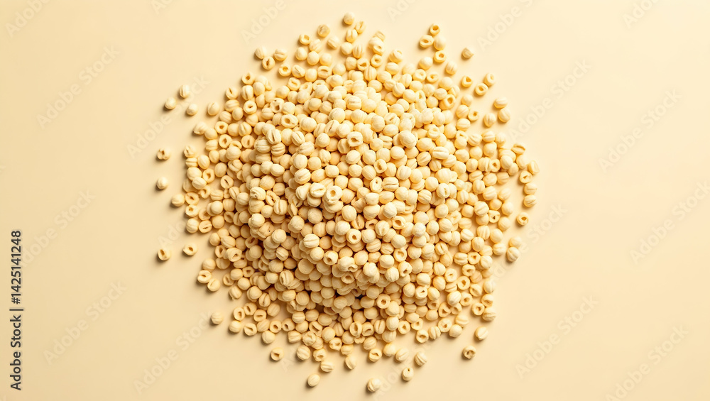 Poster top-down view of a light yellow pile of rolled oats with visible negative space for text or graphic 