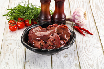 Raw chicken liver uncooked in the bowl