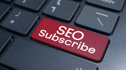 Fototapeta premium Close-up of a keyboard with a red key labeled SEO Subscribe suggesting online subscription for search engine optimization.