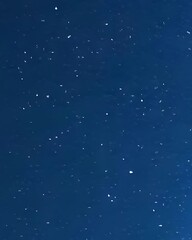 Fototapeta premium Abstract Deep Blue Texture with Scattered White Specks