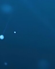 Abstract Dark Blue Background with Glowing Particles