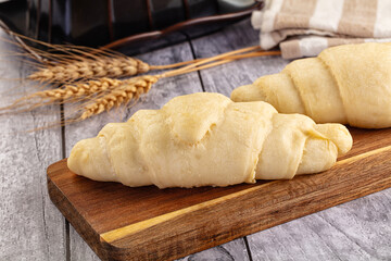 Raw uncooked croissant for bake