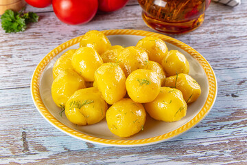Boiled young potato with oil
