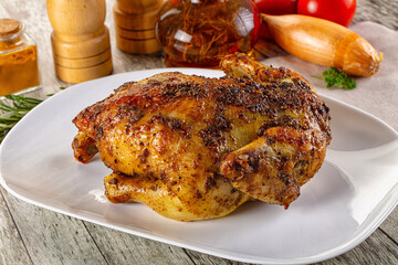 Baked in oven whole chicken with spices