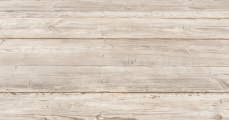 Light brown wooden planks arranged horizontally creating a textured surface background. Elegant photo with detailed texture for the background.