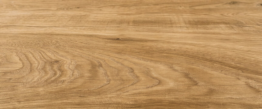 Close-up of a light brown wooden surface showing natural grain patterns. Elegant photo with detailed texture for the background. - Powered by Adobe