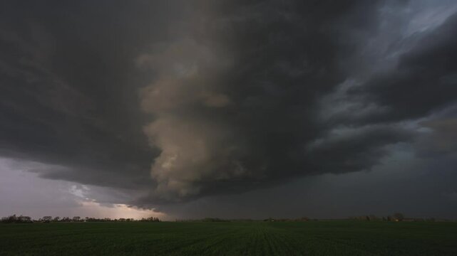 Time lapse of supercell storm rolling through the fields in Lithuania, dark storm clouds