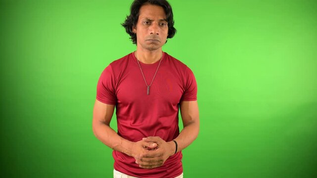 Guy stands sad with heartbroken look