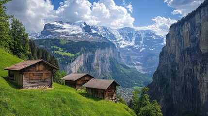 Obraz premium Alpine Paradise: Wooden Chalets Nestled in the Swiss Alps