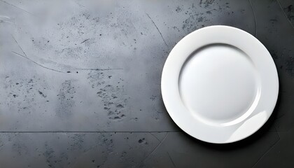 White plate on right side of gray concrete background using &frac34; Camera Angle Perspective