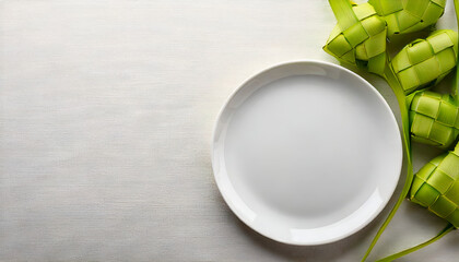 White plate on Right side of white table background with ketupat Ornament, using &frac34; Camera Angle