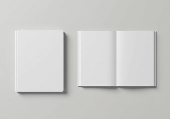 The photograph captures two blank white softcover books, one open and one closed, presented on a light gray surface as a simple and versatile mockup