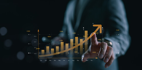 Businessman pointing at a golden upward graph, representing financial growth, business success, data analysis, investment performance, and economic progress in digital strategy.