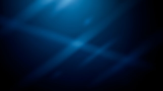 Blue light leak overlay with glowing streaks on dark background creating abstract atmospheric effect for artistic projects or design visual