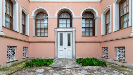 Exterior photograph of the Harem building situated within the courtyard of Dolmabahce Palace, Istanbul, Turkey