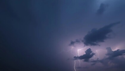 Dramatic cloudscape illuminated by lightning strikes during a thunderstorm