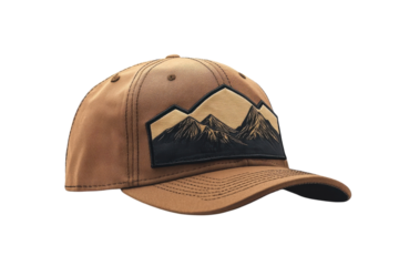A stylish brown mountain themed trucker hat perfect for outdoor adventures features a detailed embroidered patch and a comfortable fit on transparent background