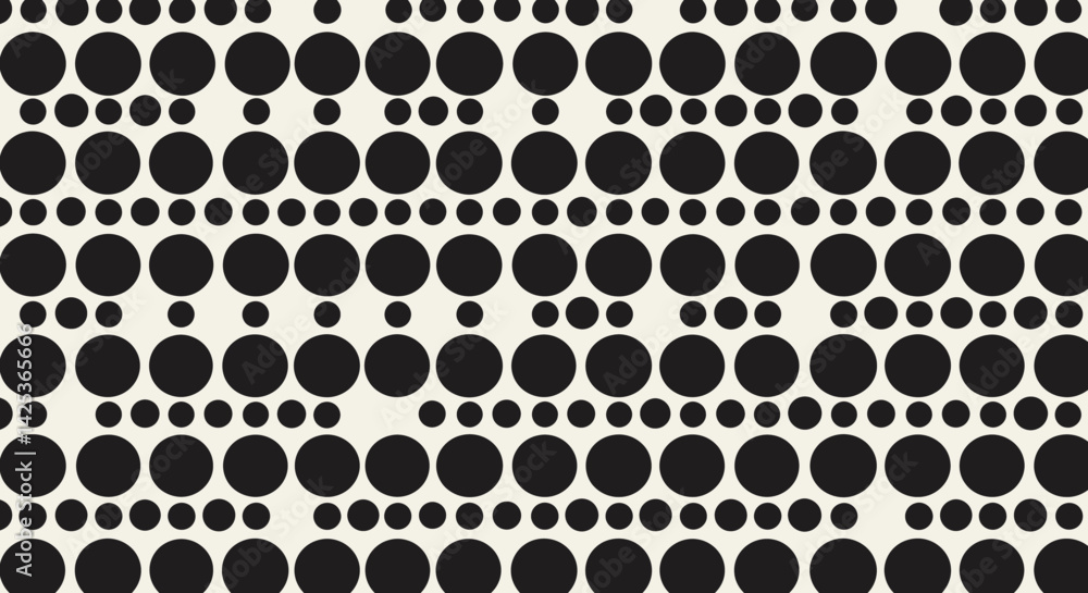 Poster textured black circles on a cream backdrop create a rhythmic minimalist pattern suggestive of bubble