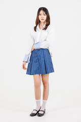 Portrait full body asian young beautiful pretty happy woman she smiles cute friendly wears white shirt blue mini skirt casual clothes standing on white background studio. Lifestyle fashion concept.
