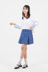 Portrait full body asian young beautiful pretty happy woman she smiles cute friendly wears white shirt blue mini skirt casual clothes standing on white background studio. Lifestyle fashion concept.
