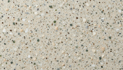 Close-up of a textured surface with various small stones and particles.
