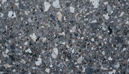 Close-up of a textured concrete surface with various aggregates.