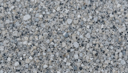 Close-up of a textured concrete surface with various stone aggregates.