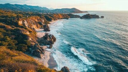 Obraz premium A high-altitude shot of a rugged coastline, featuring a mix of rocky outcrops, beaches, and the open sea.