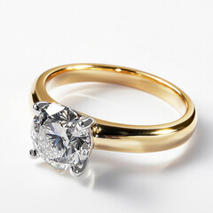 Classic diamond solitaire ring on gold band, isolated on white background