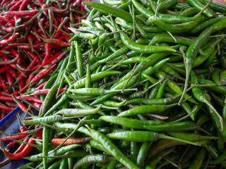 Fresh Organic green chilli peppers at local market.