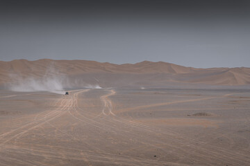 Rolling sand dunes, striped lines, beautiful silhouettes, in the Kumtag desert, Xinjiang, China