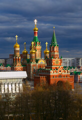 Top view on the Spasskaya Tower copy from the Moscow Kremlin and Cathedral of the Annunciation of the Holy Virgin Mary. Archangel sloboda and Square of the Holy Virgin Mary, Yoshkar-Ola city.