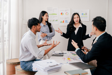 Brainstorming of young modern group. Team meeting to achieve goal. Business people discussing finance business and analysis. Teamwork concept in modern office. Calculating personal tax for client.